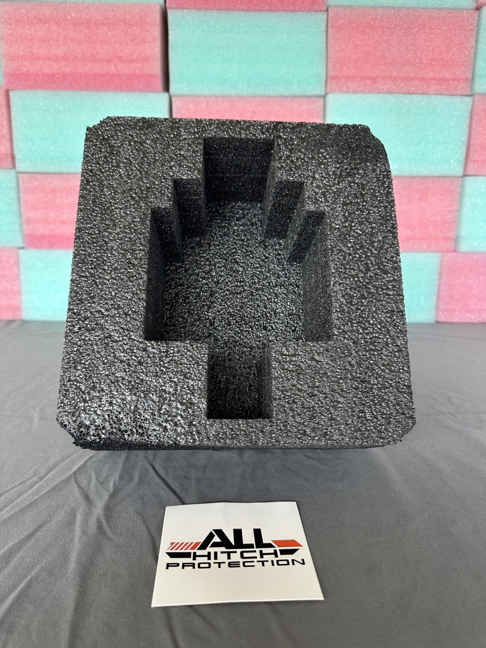 Black foam insert with stepped cutouts for secure component placement.