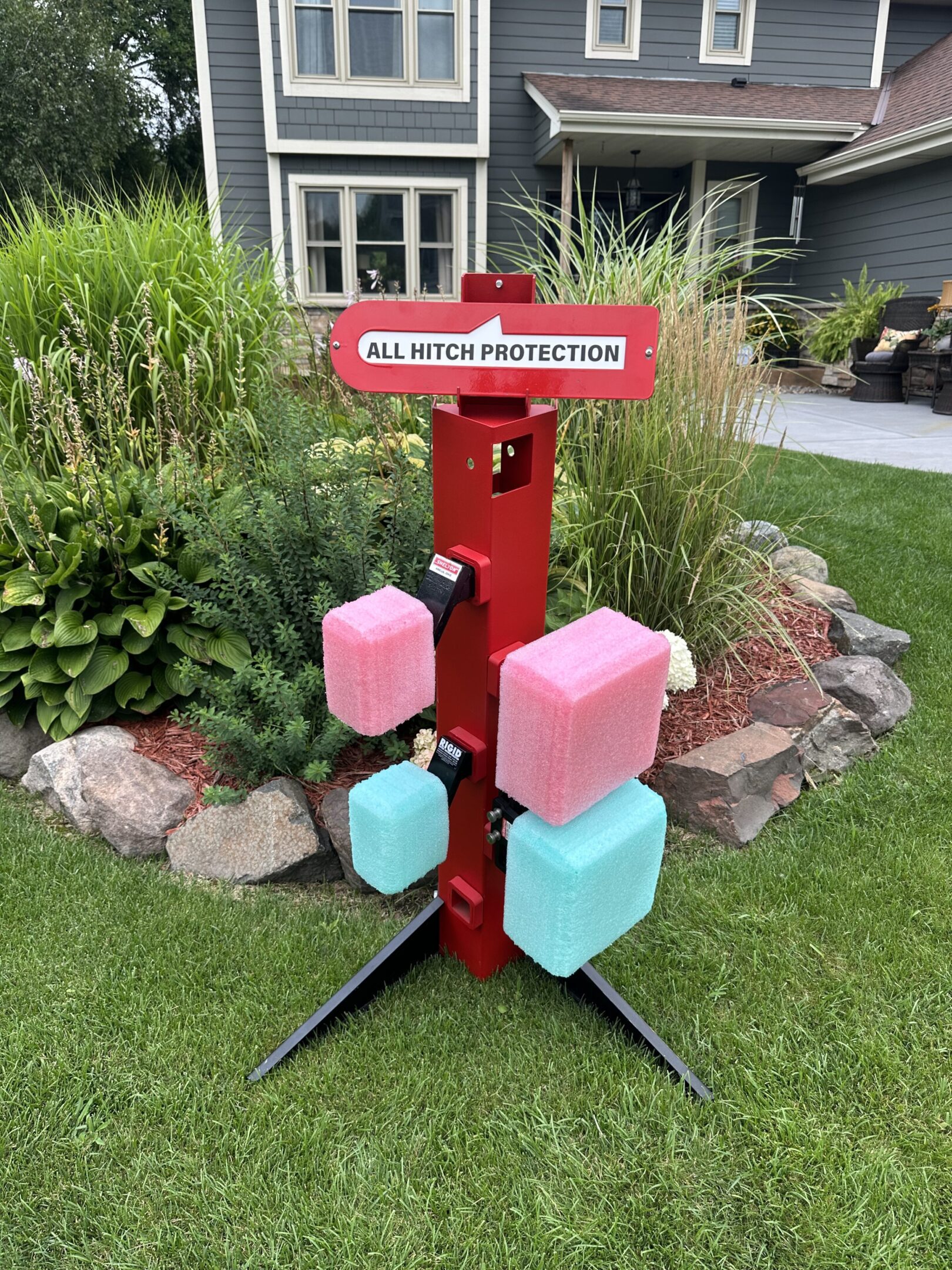 A colorful fire protection station with extinguishers outdoors.